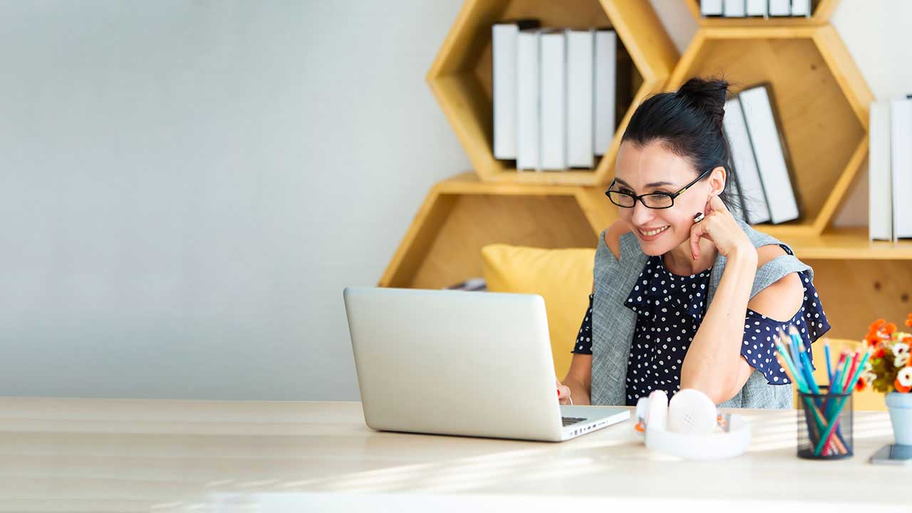 woman checking her account online with her laptop